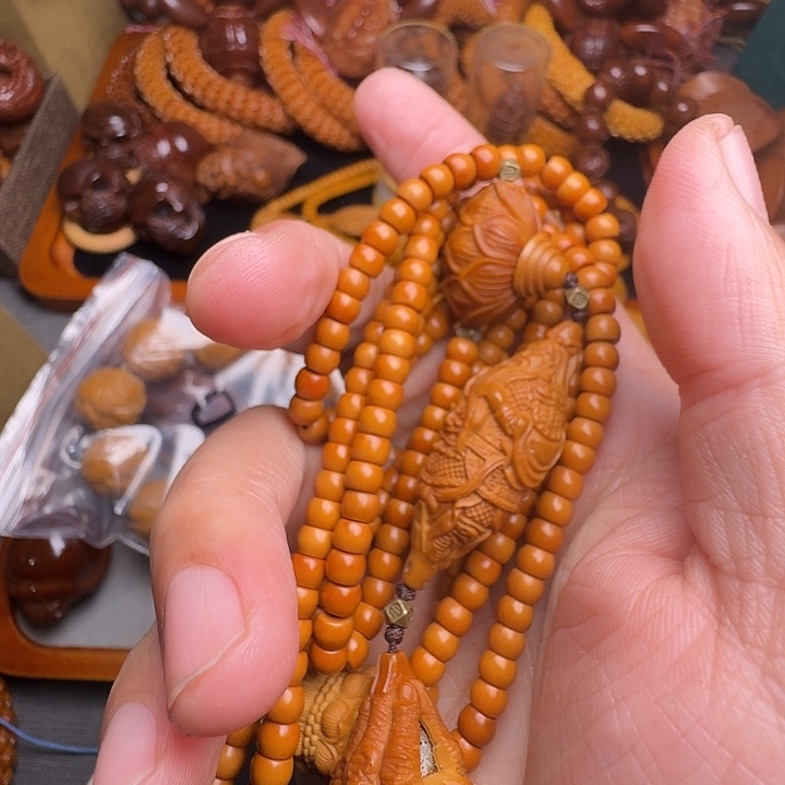 橄榄核吊坠您的孩子王