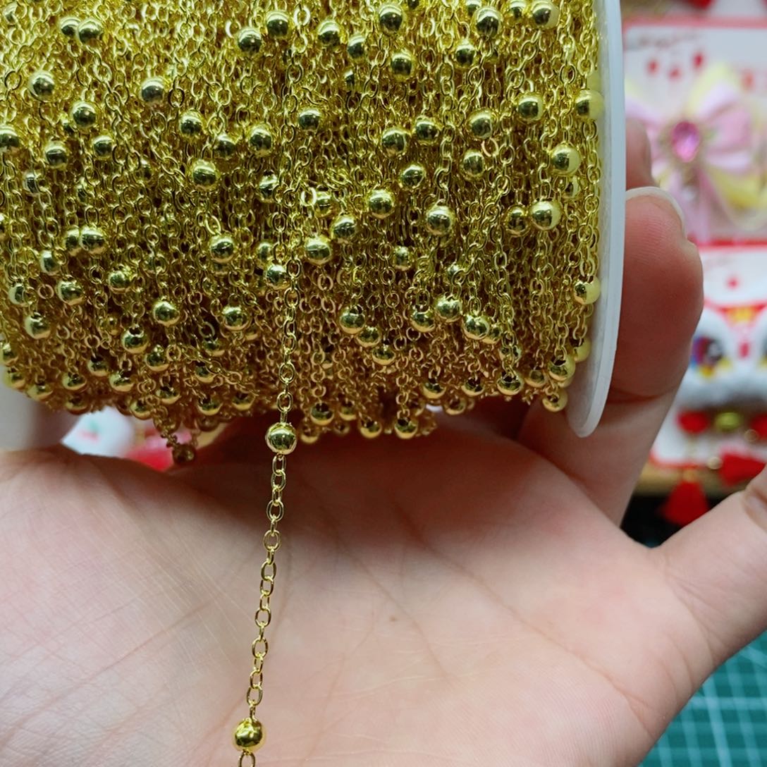 金色夹珠链条 30码一卷