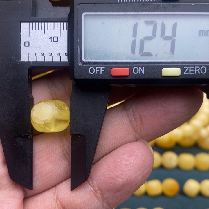 琥珀未镶嵌裸石19号12.4*9.8喇叭口瑕