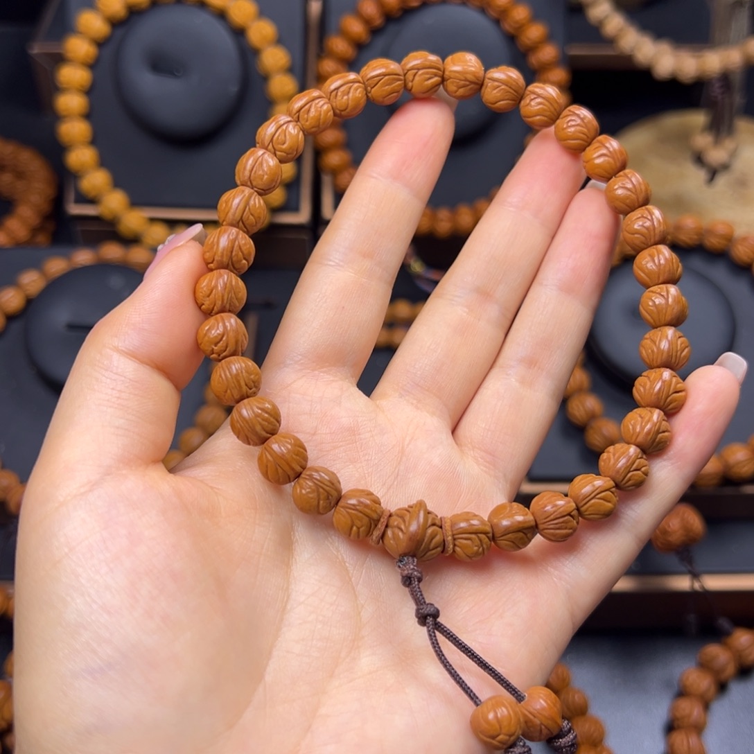 十***月桃核手串野生玉龙脊0.9