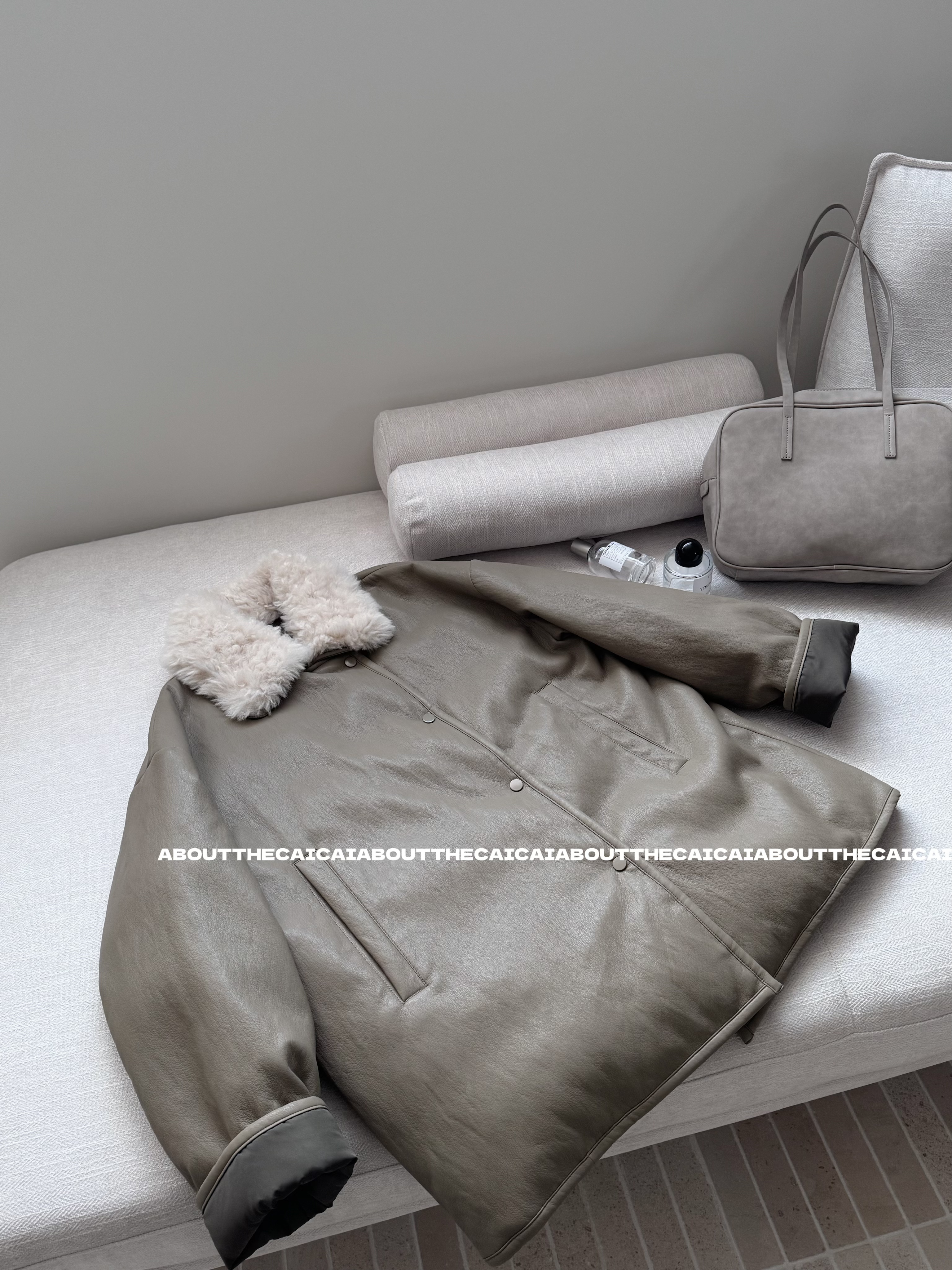 CAICAI/冬季软糯羊羔绒翻领中长款保暖皮衣加厚外套女-837