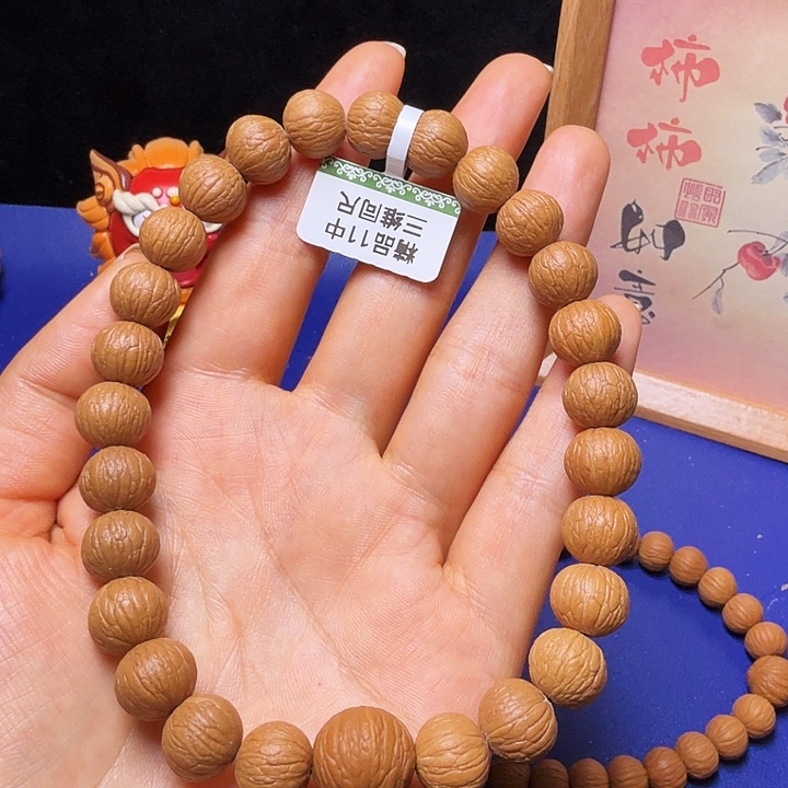 小***房吊坠猴头核桃凤羽
