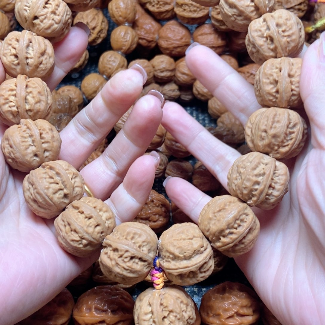 郑***堂吊坠桃核磨盘粗筋