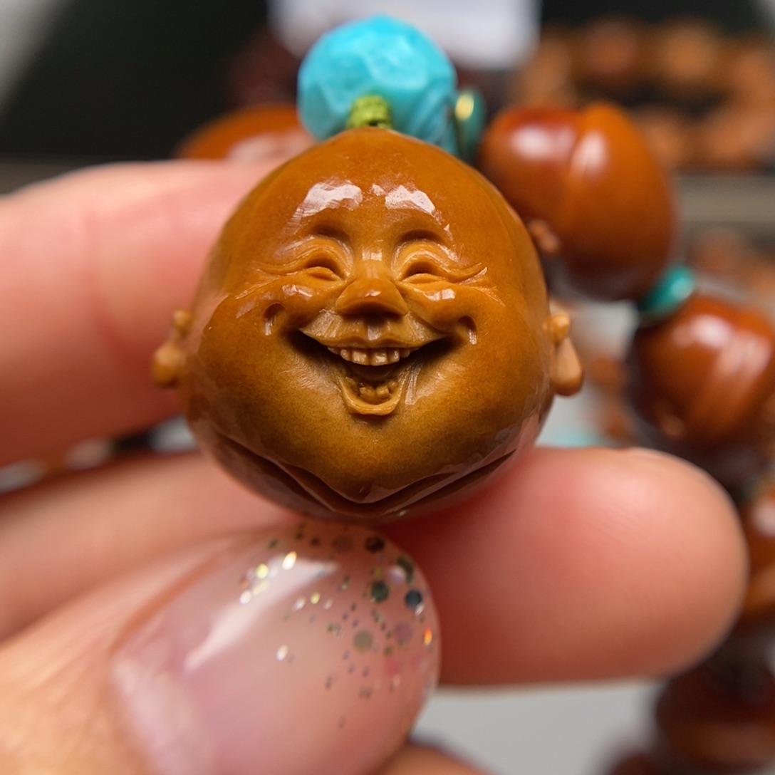 橄榄核吊坠笑佛单子