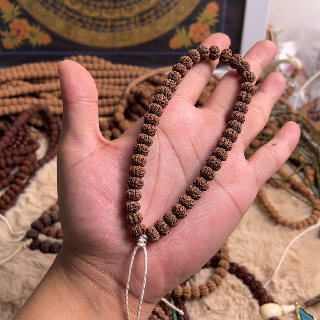 盖***伦金刚菩提吊坠凹底梅花