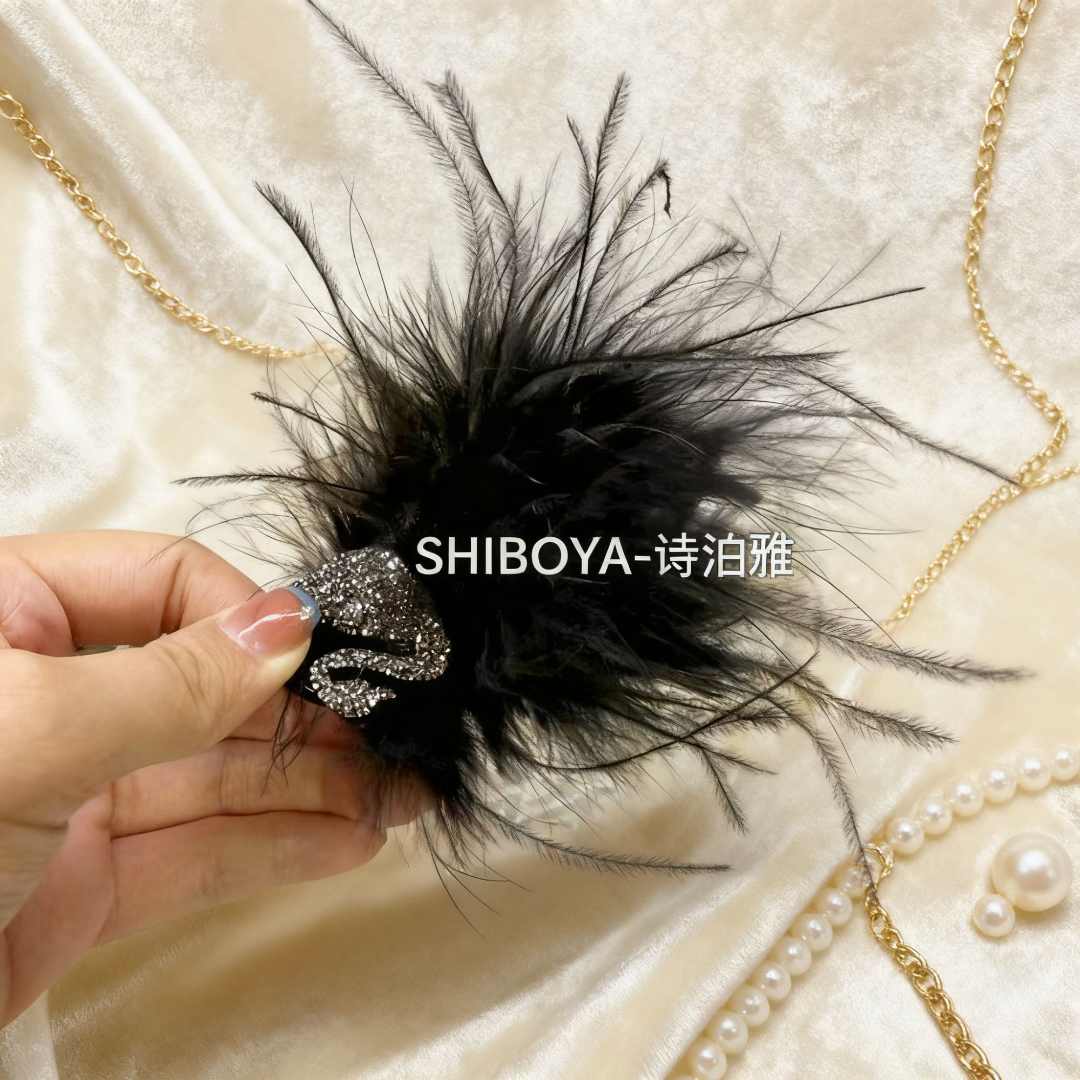 诗泊雅 新款小天鹅羽毛抓夹丸子头丸子头