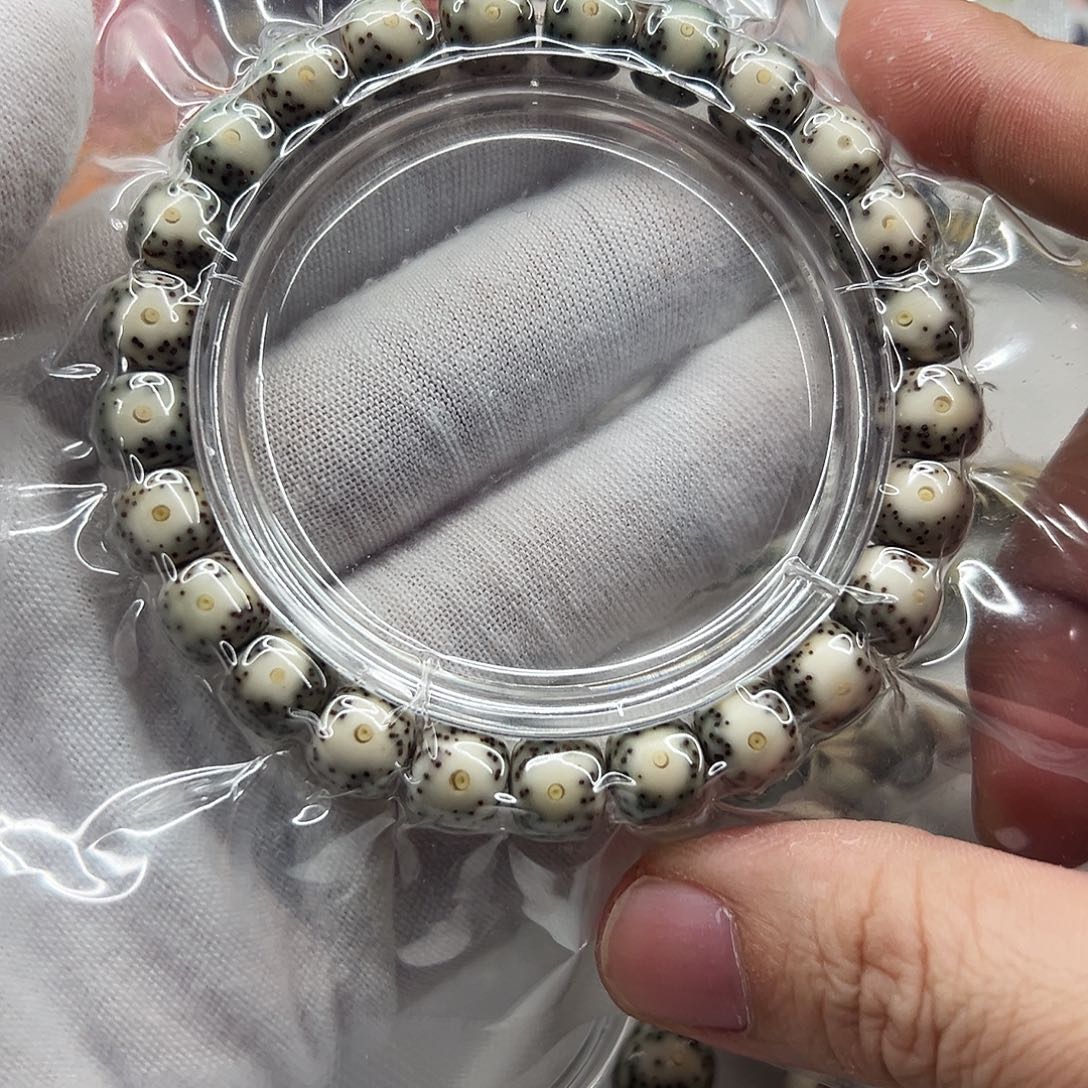 李***一星月菩提手串98绿包白黄金瞳31