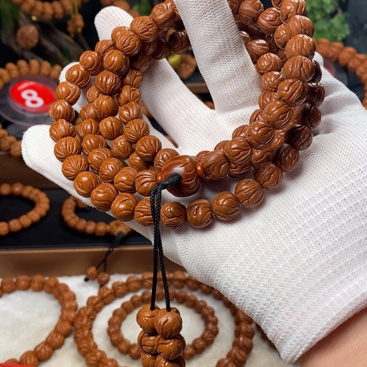 桃核吊坠平*哥秦岭龙纹