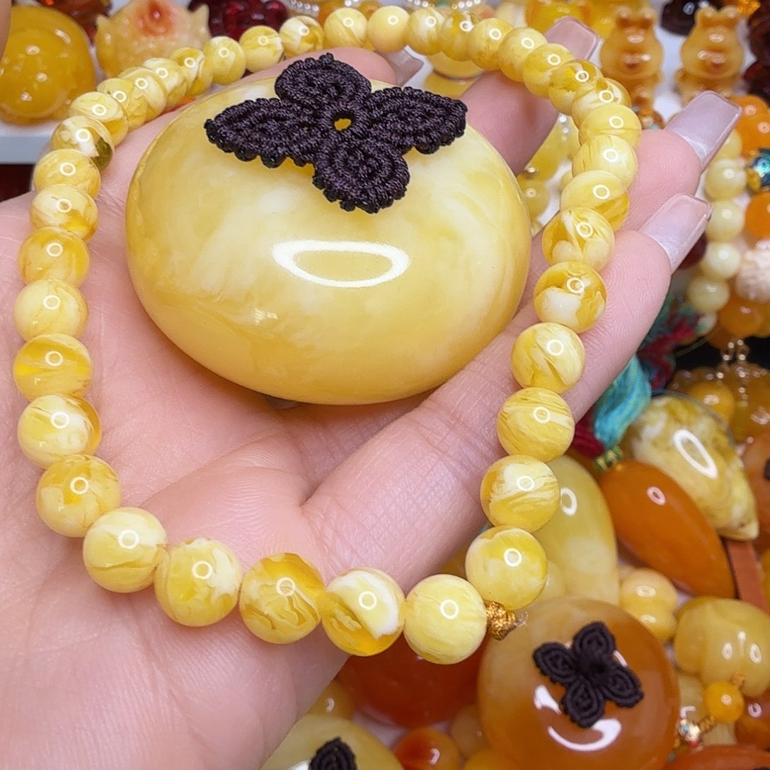 忆***惜非金属白花蜜柿子手持