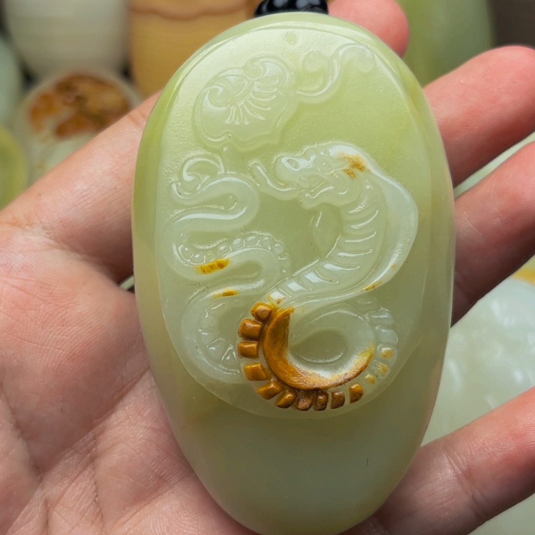 阿***哥石材方解石手把件蛇