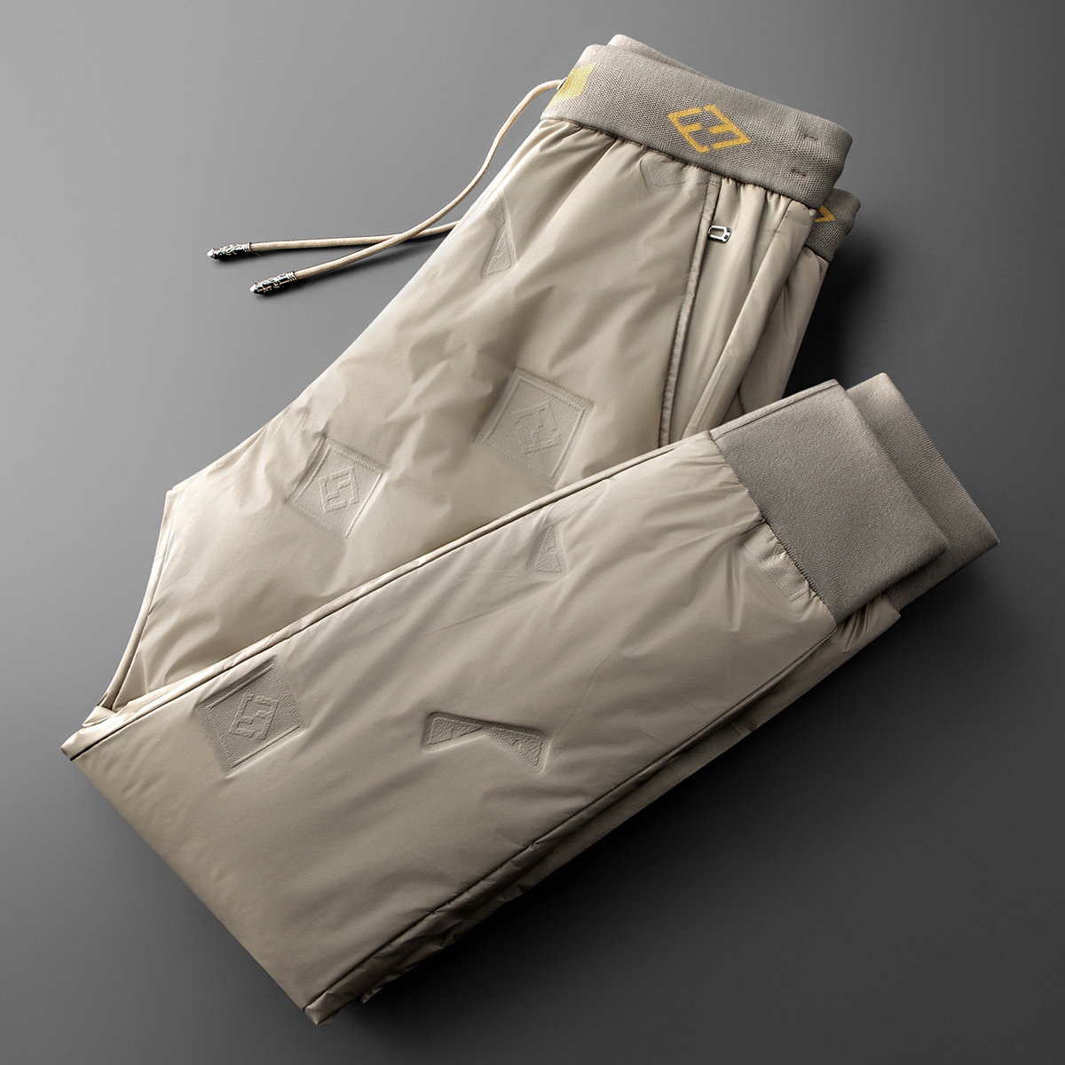 冬季户外压胶防水男女情侣款加厚保暖白鹅绒小脚休闲羽绒裤男外穿