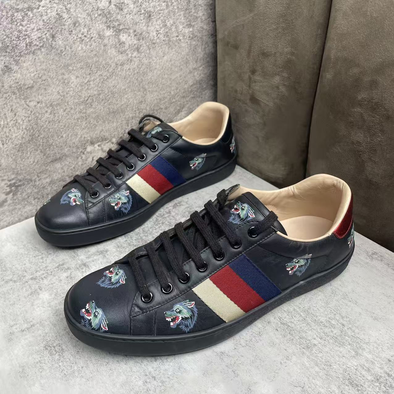 95新 GUCCI/古驰 黑色皮革时尚狼头印花ACE低帮板鞋/40码
