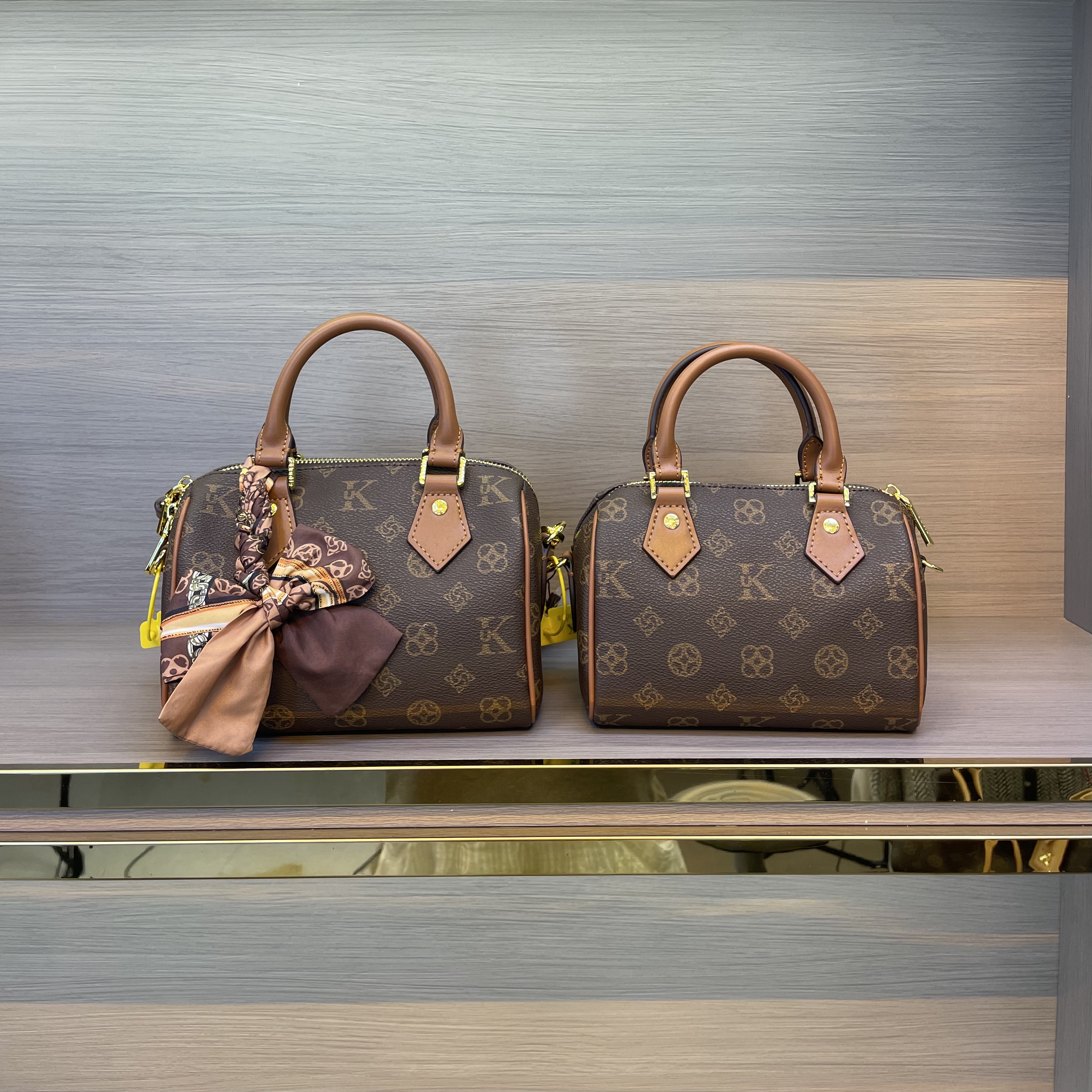 优库迪斯UK新款时尚经典百搭单肩斜挎手提枕头包