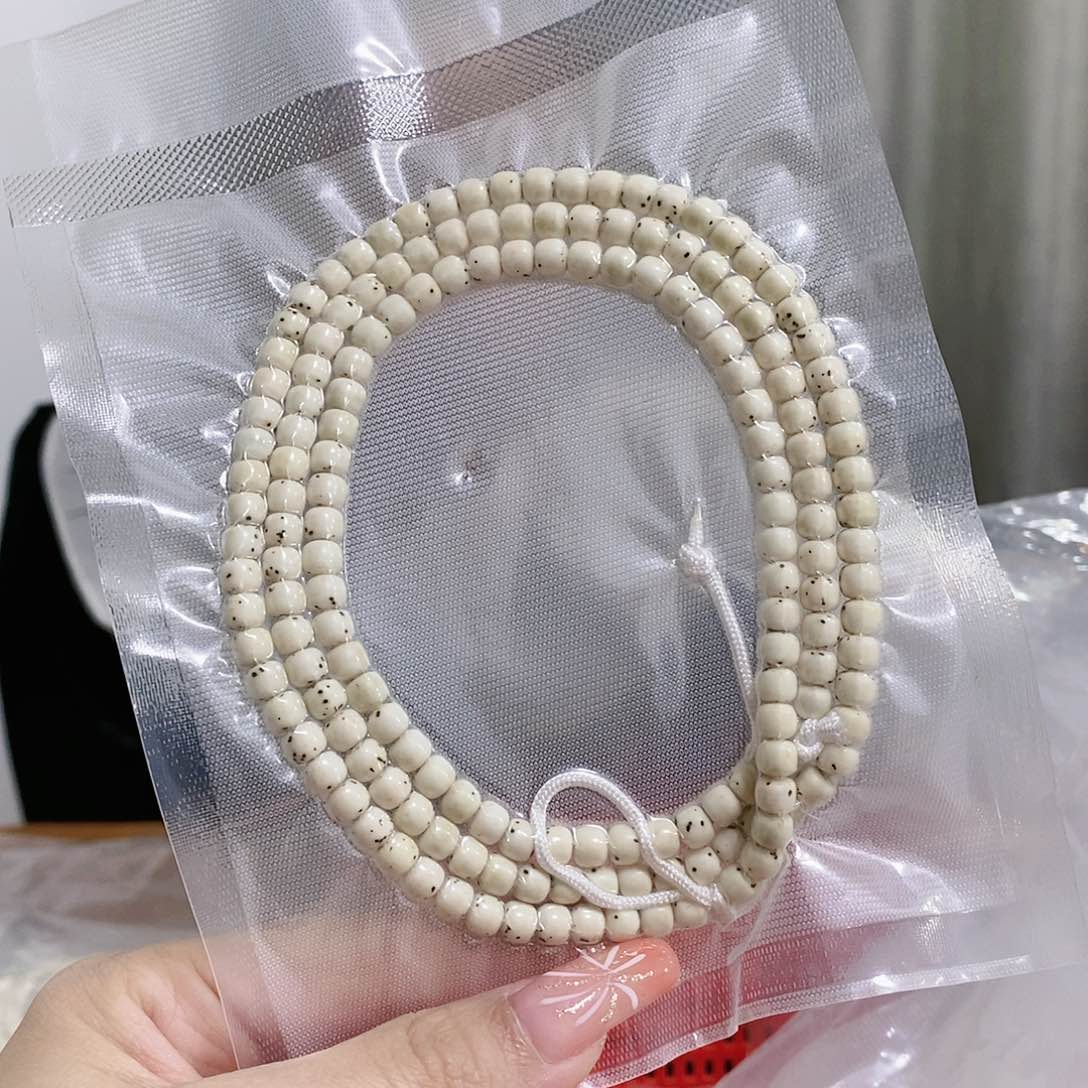 星月菩提手串海南原生态星月菩提原白数星星长串5.4