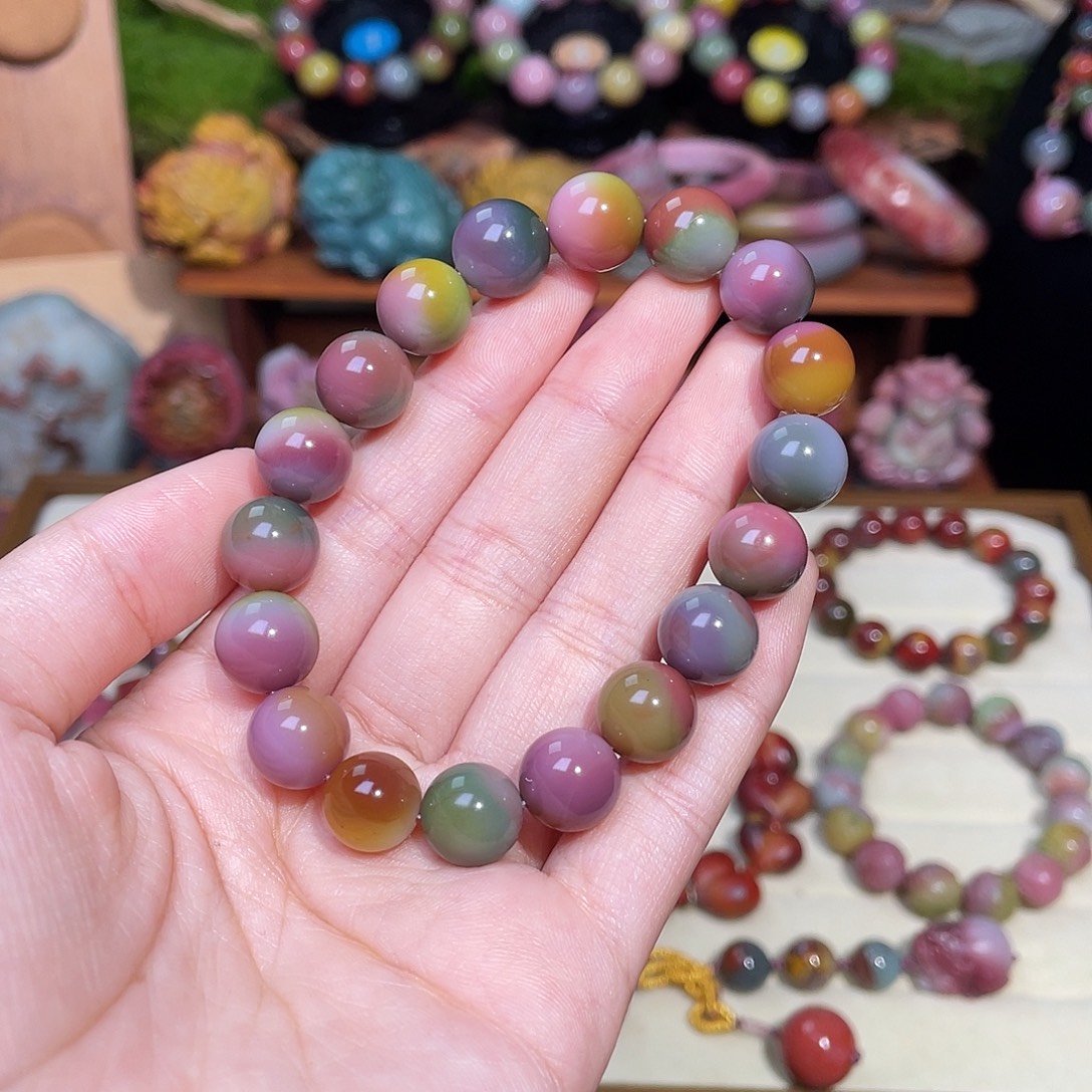 苏***么玛瑙/玉髓未镶嵌手串盐源玛瑙炫彩彩虹手串