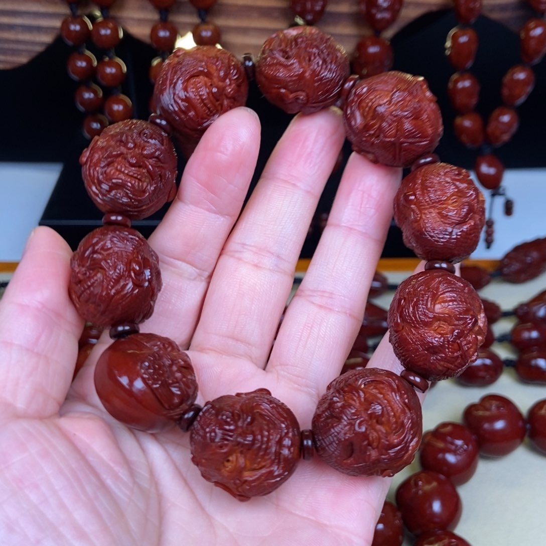 哈***喽橄榄核吊坠双面恶僧