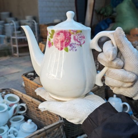 库存微瑕多孔茶壶