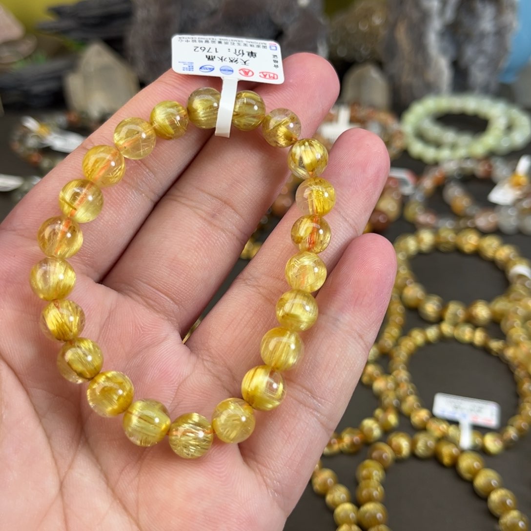 水晶手串未镶嵌早**吗钛晶