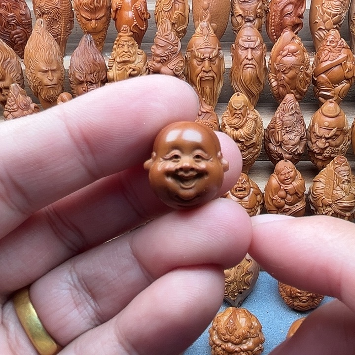 橄榄核吊坠18开心