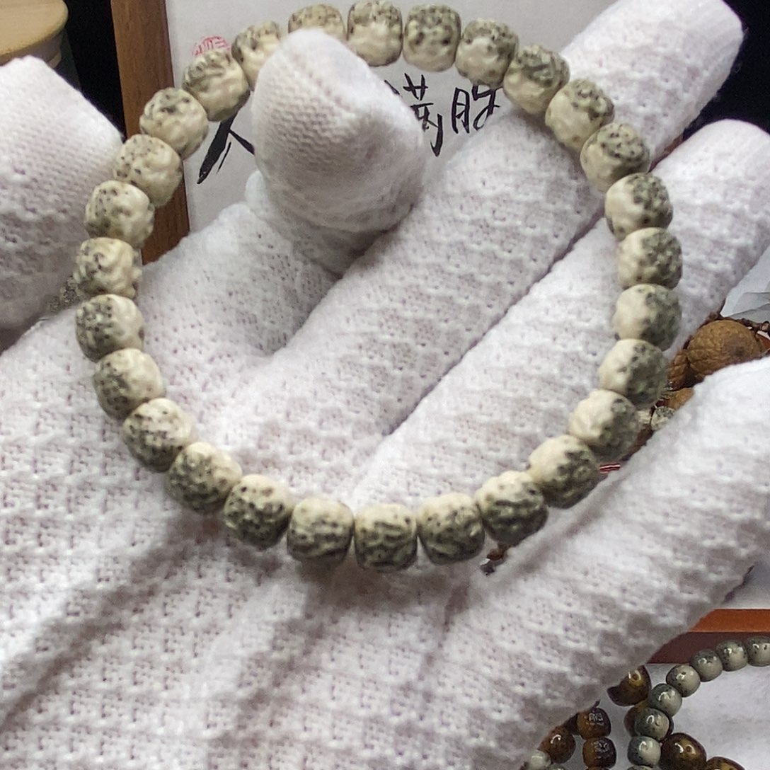 朴***๑星月菩提吊坠卡8/7绿包白河豚傲然无相