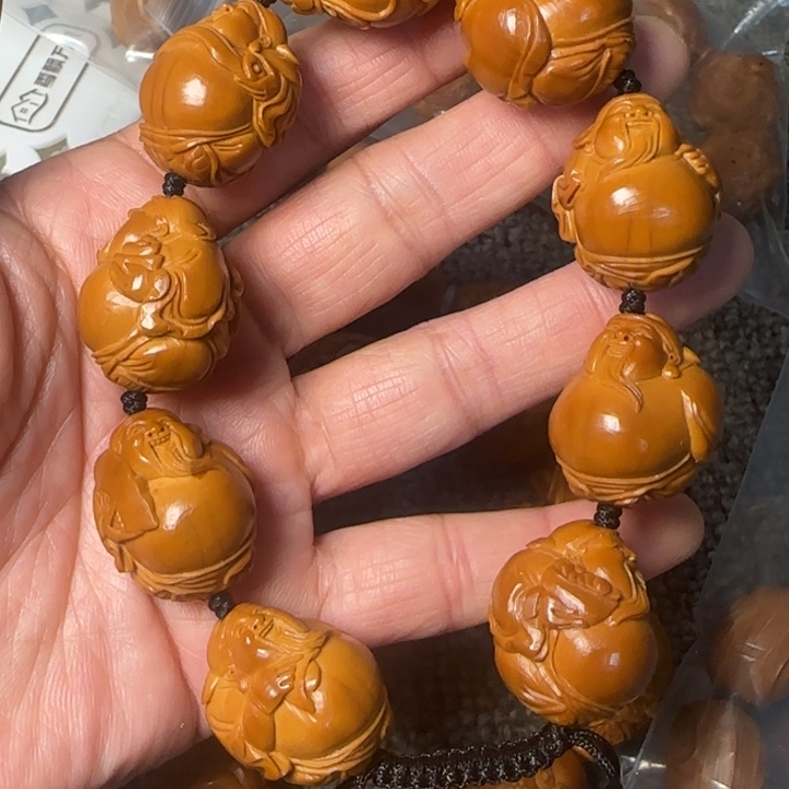 子***涂吊坠橄榄核八方来财