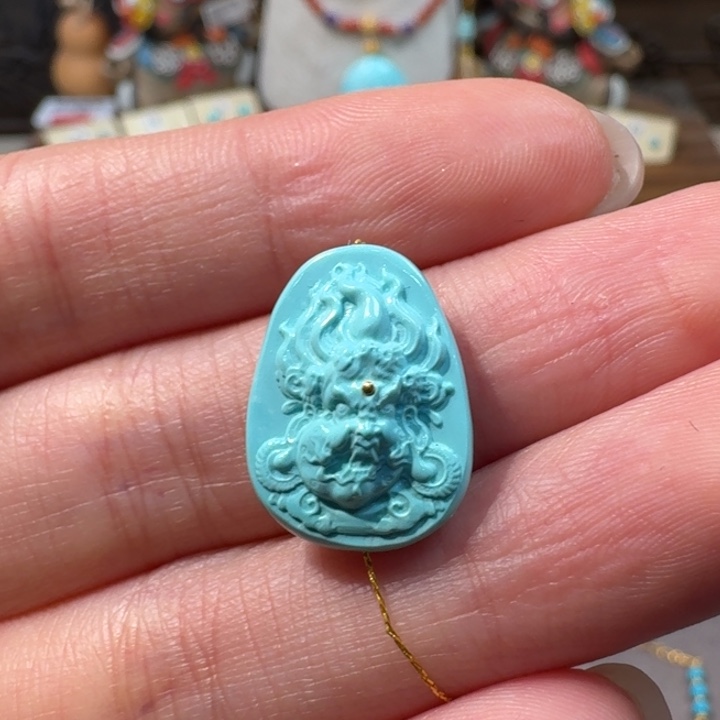 绿松石未镶嵌大黑天雕刻件