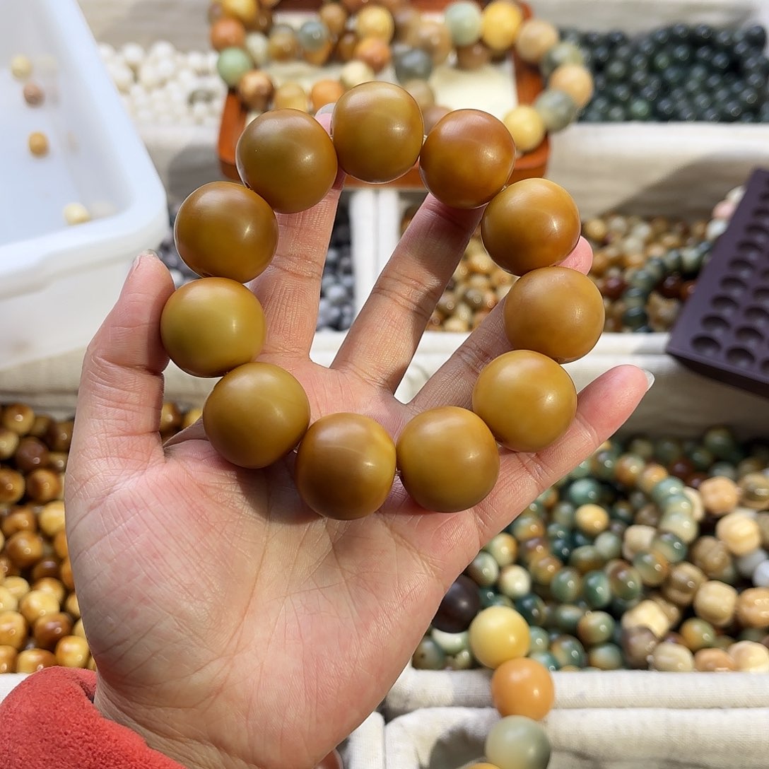菩提根/象牙果手串哲*猪卡24手工干磨默认微瑕11颗
