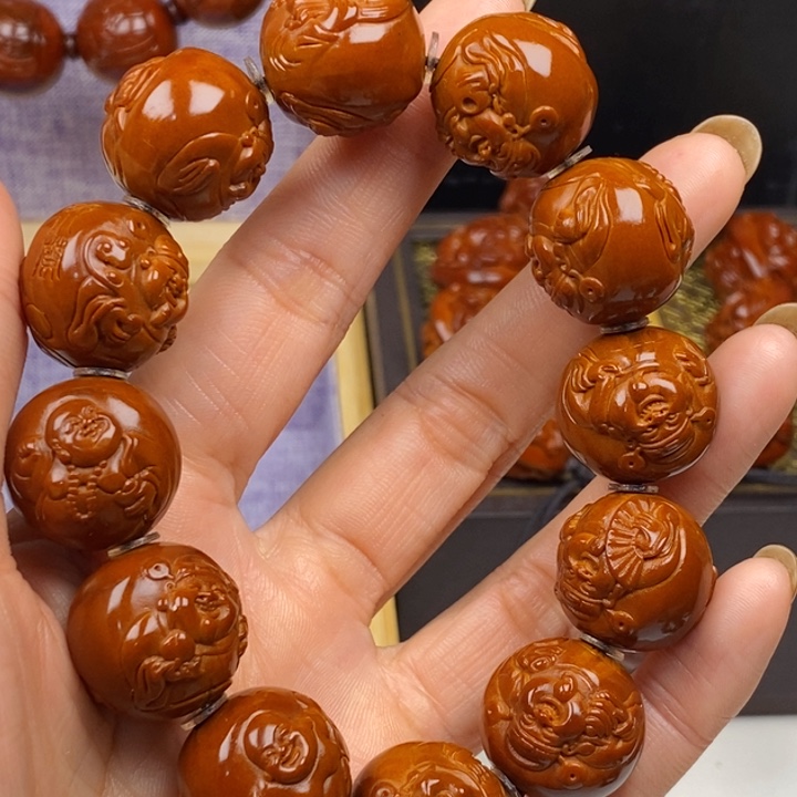 橄榄核吊坠温****?橄榄核手串