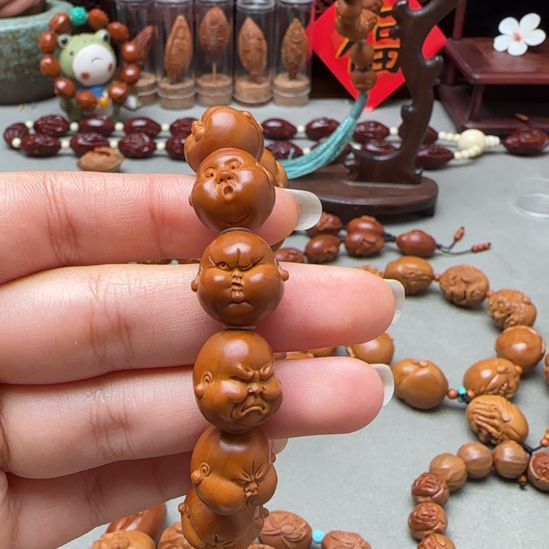 橄榄核手串/手链石****司人生百态