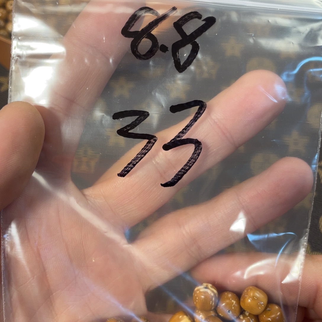 紫金鼠手串8.8实心散珠33