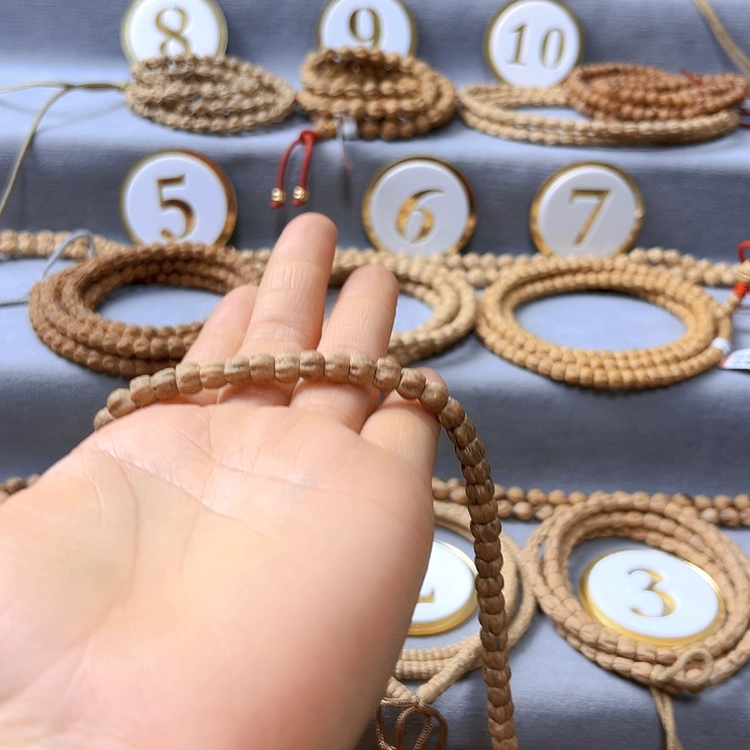 柏香籽/百香籽手串阜***哥