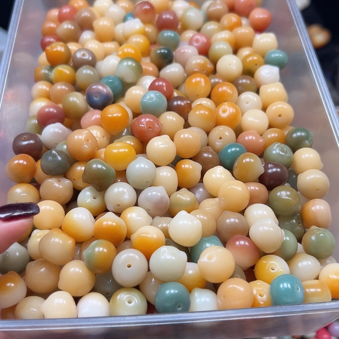 爱***粉手串菩提根/象牙果卡17多宝猫头50颗