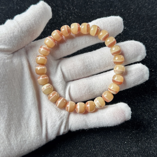 原生态驼骨三花手串9*8微微棕