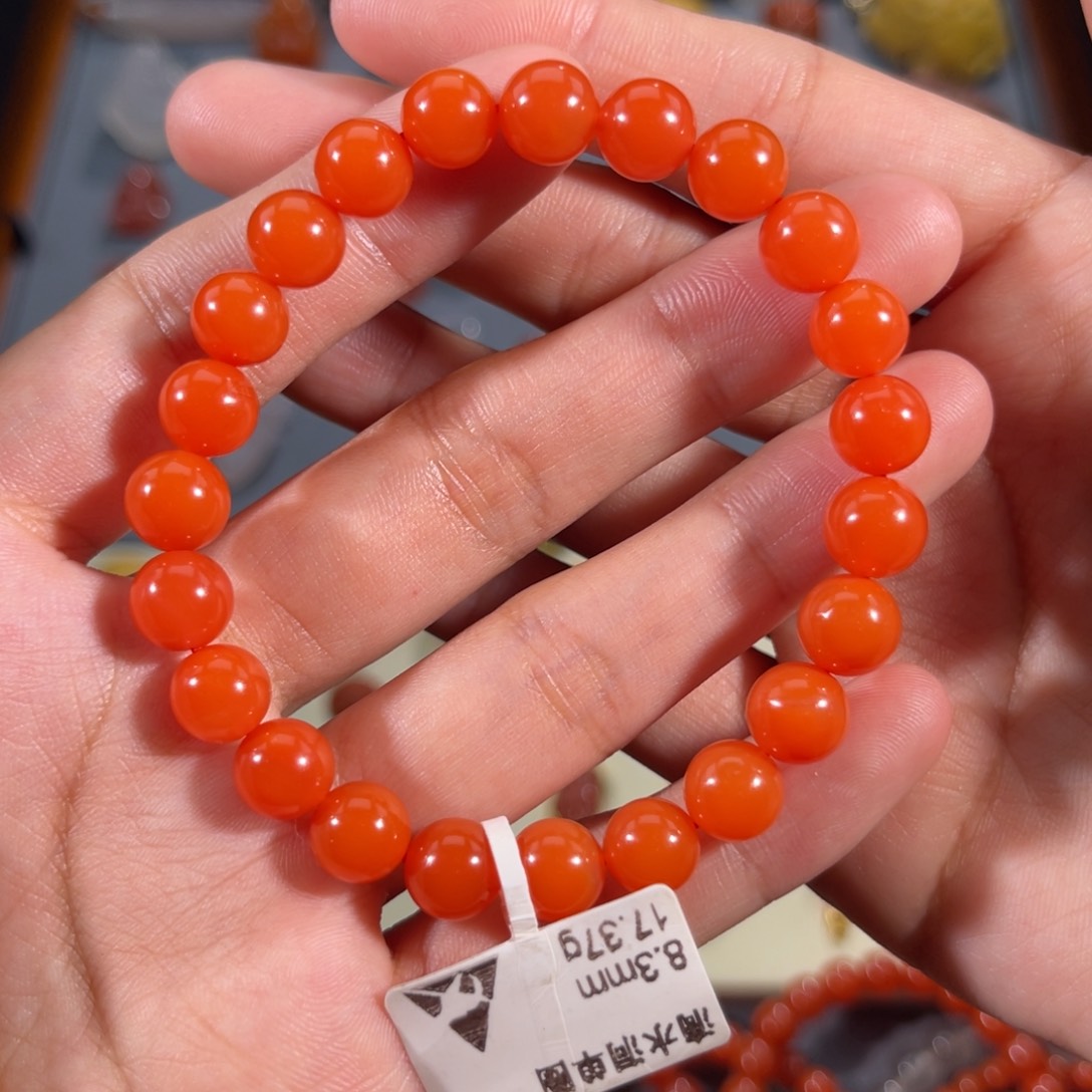 南红玛瑙滴水洞满色满肉圆珠手串8左右未镶嵌幺*