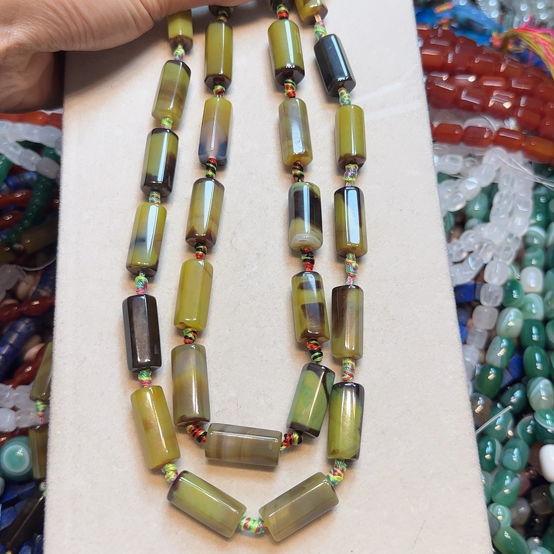 玛瑙/玉髓未镶嵌珠宝半成品黄绿孔雀玛瑙圆柱一条