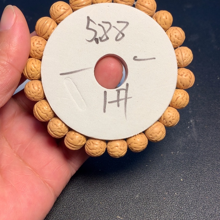 羅***崋桃核吊坠1号健健康康了