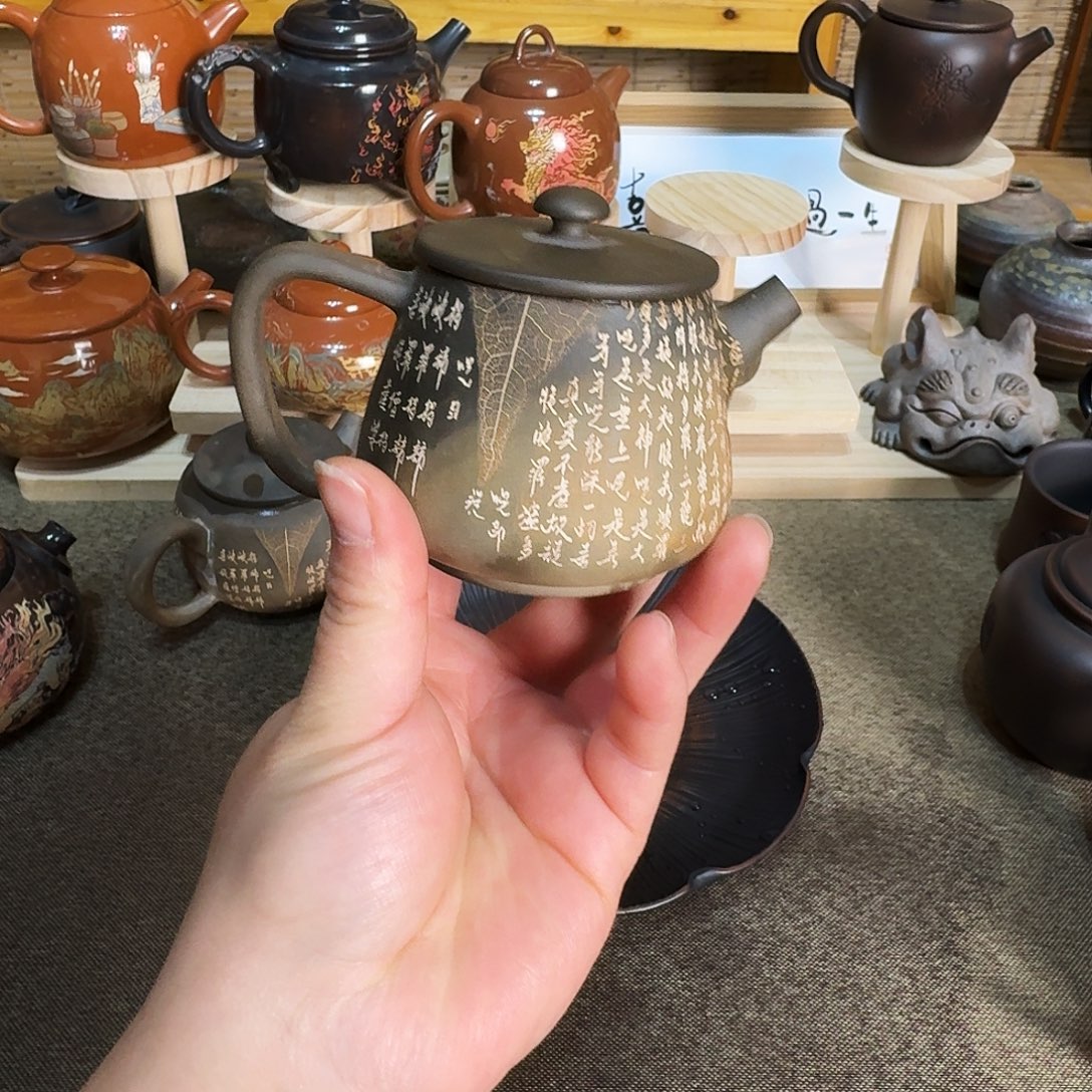 鹿***猫建水紫陶手磨心经小石瓢