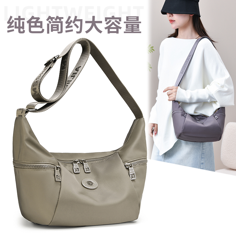 高级感轻便百搭饺子包单肩包休闲简约时尚手提牛角包多隔层斜跨包