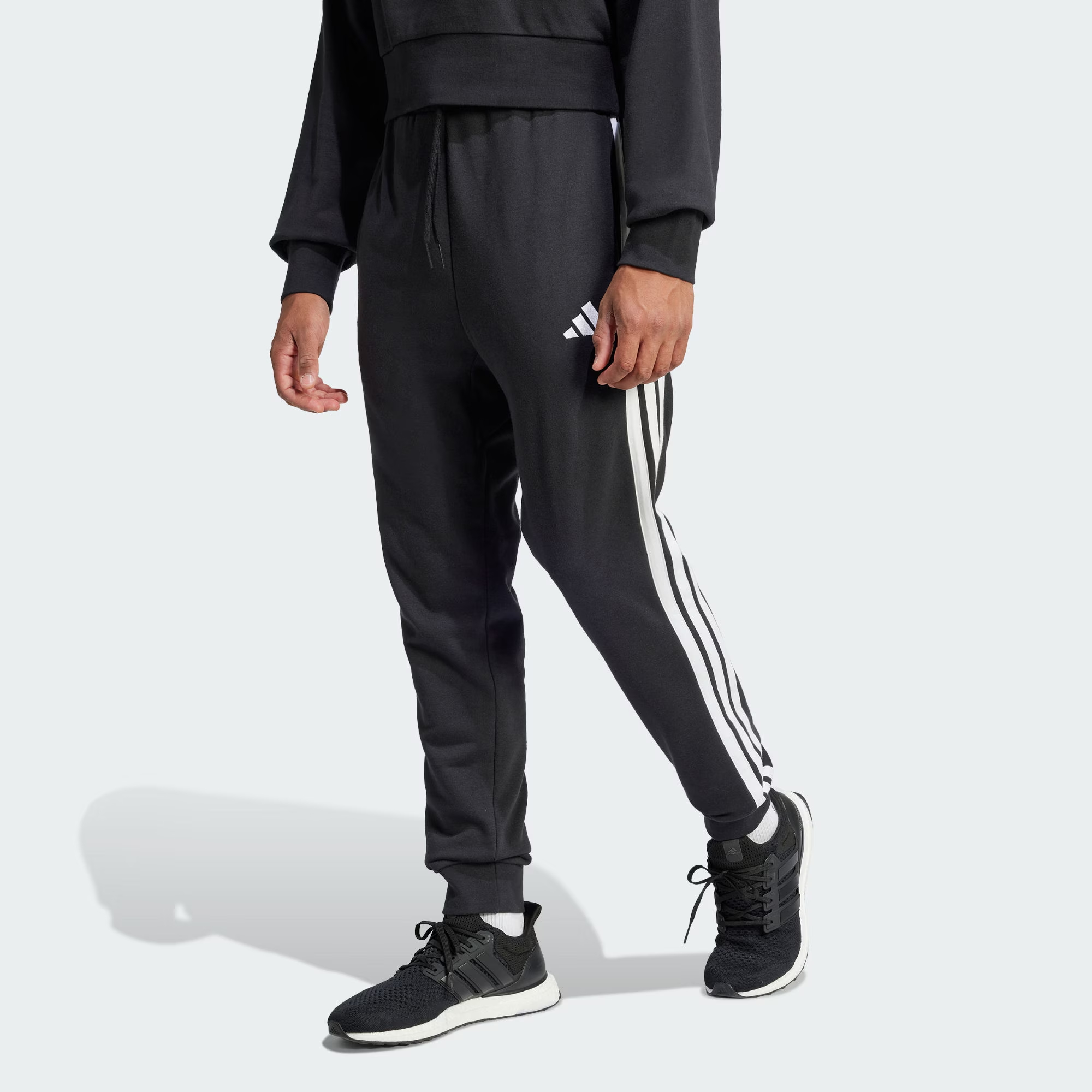 adidas/阿迪达斯男子春季新款束脚锥形针织运动休闲裤黑色JD1881