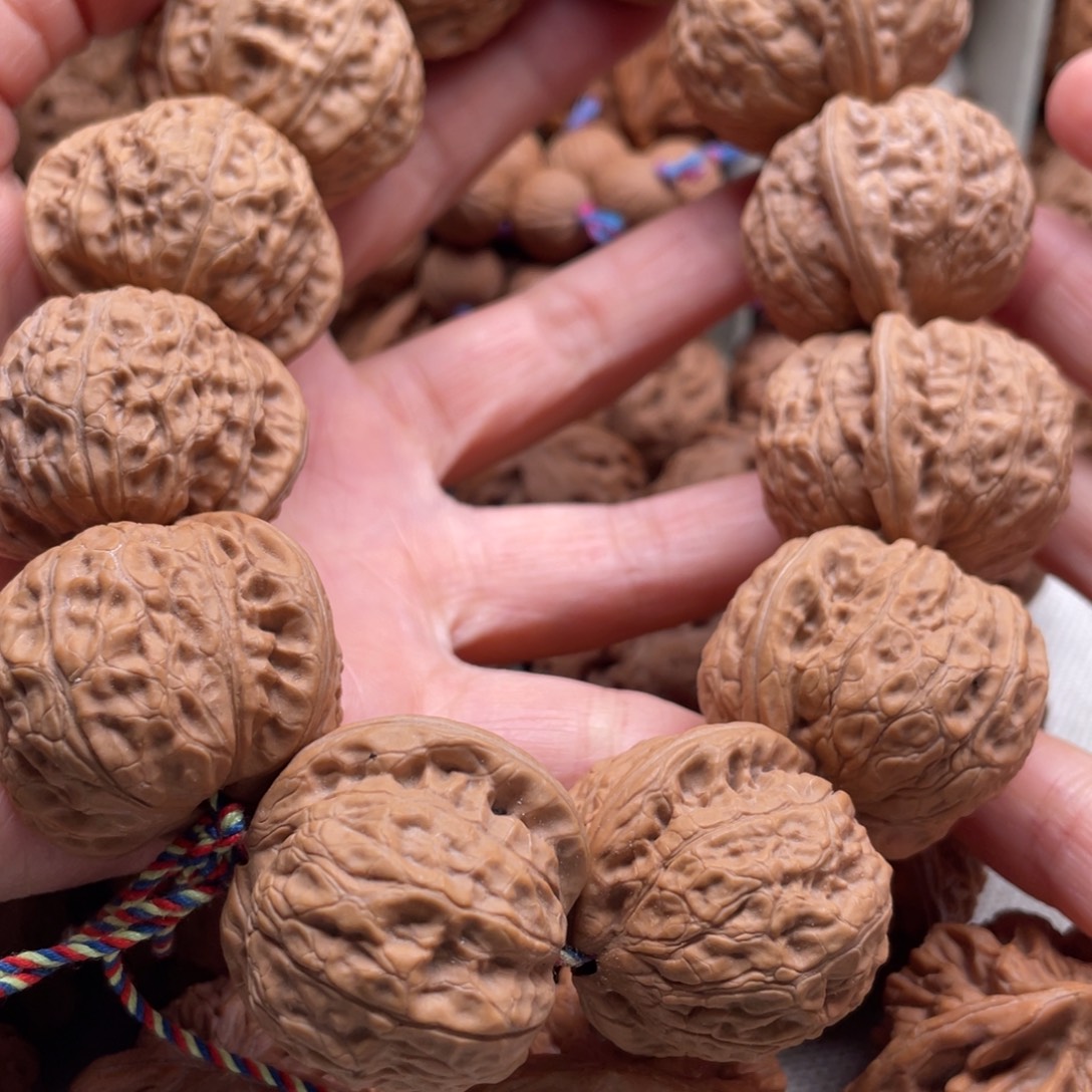 小***白文玩核桃吊坠乾隆全品手持哈