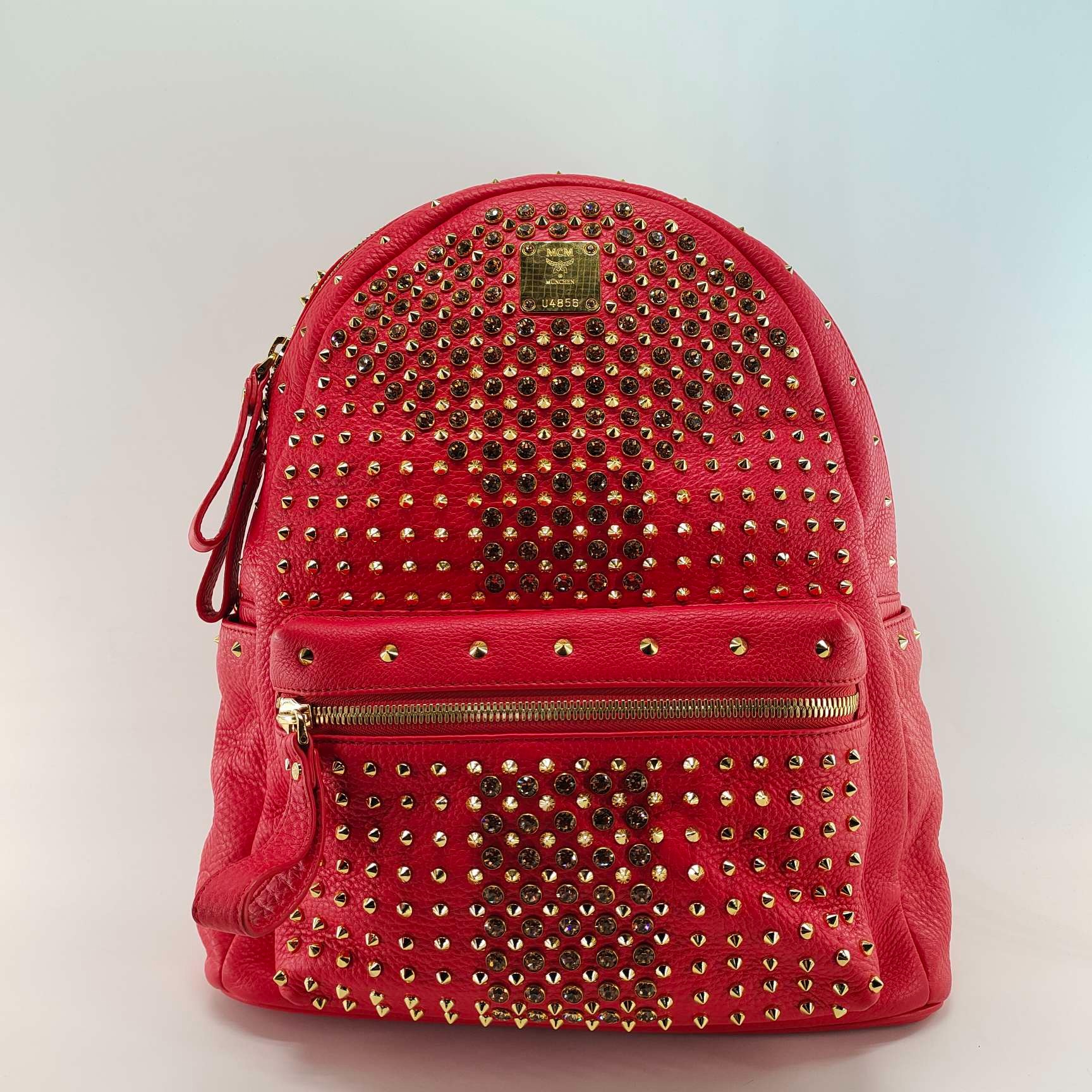 99新 MCM MCM铆钉红色全皮双肩包 施华洛世奇 时尚潮流