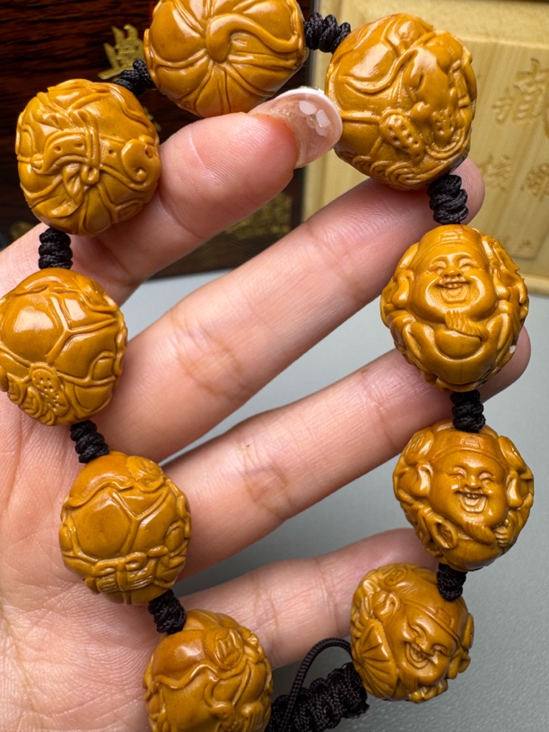 橄榄核雕刻 精品手工荷叶财神手串