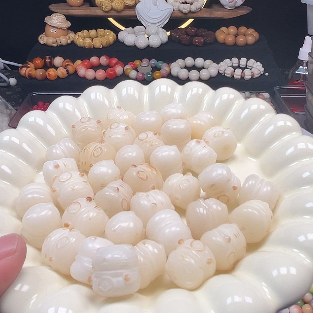 菩提根/象牙果手串100颗炭烧招财猫有裂瑕疵