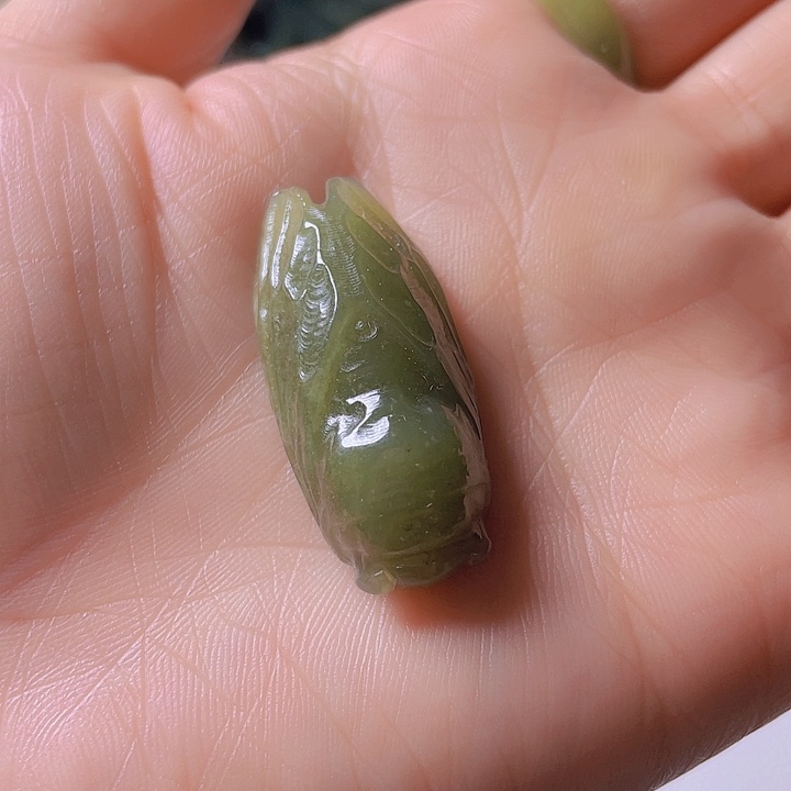 和田玉手把件未镶嵌