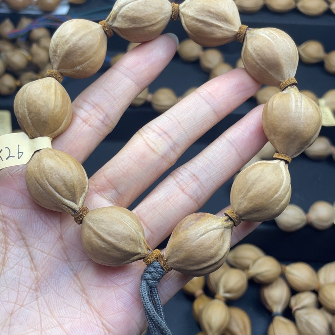 M***n001橄榄核三花20*26