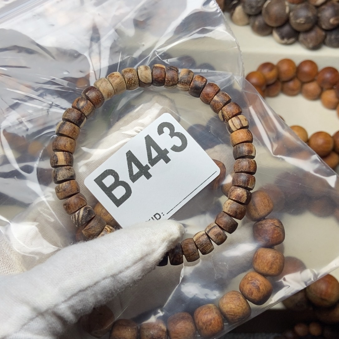 三***八贡木5/8药片珠妖花手串443