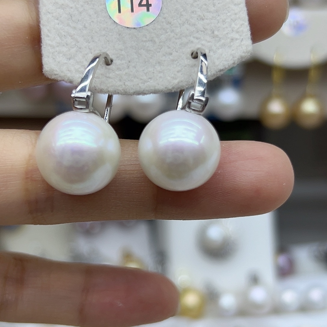 银S925镶嵌淡水珍珠耳饰我****?12