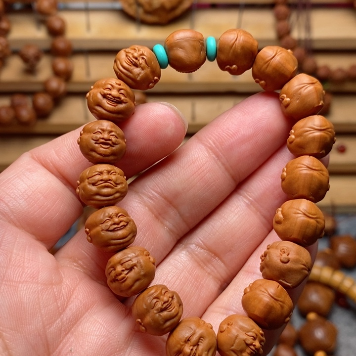 桃核雕刻人生百态手串