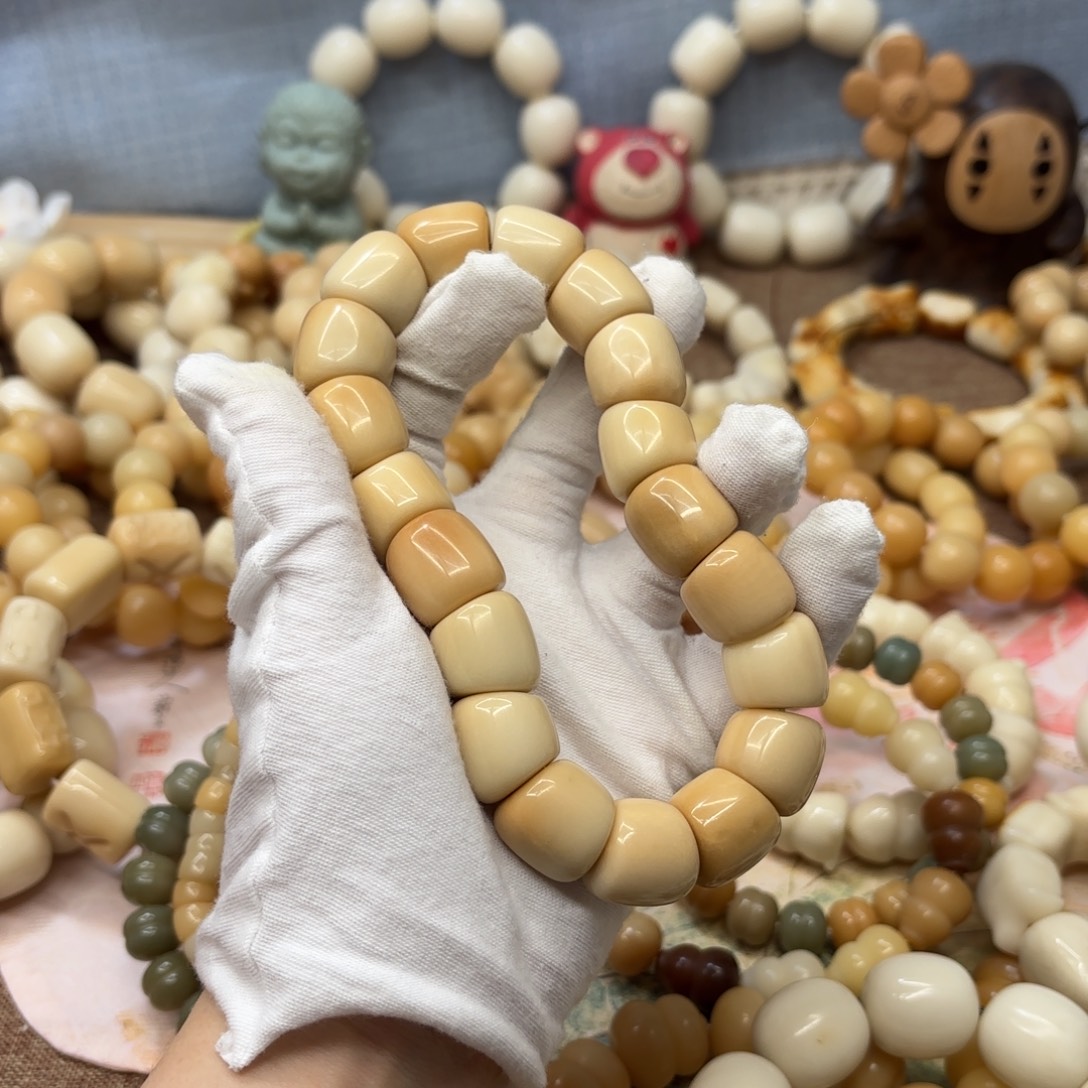 妮***仔吊坠菩提根/象牙果18干磨牙果风化年糕肠893