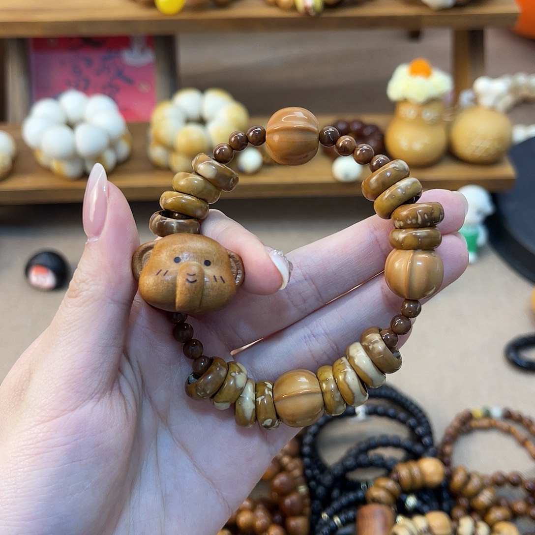 嗨***嗨手串紫金鼠甜甜圈